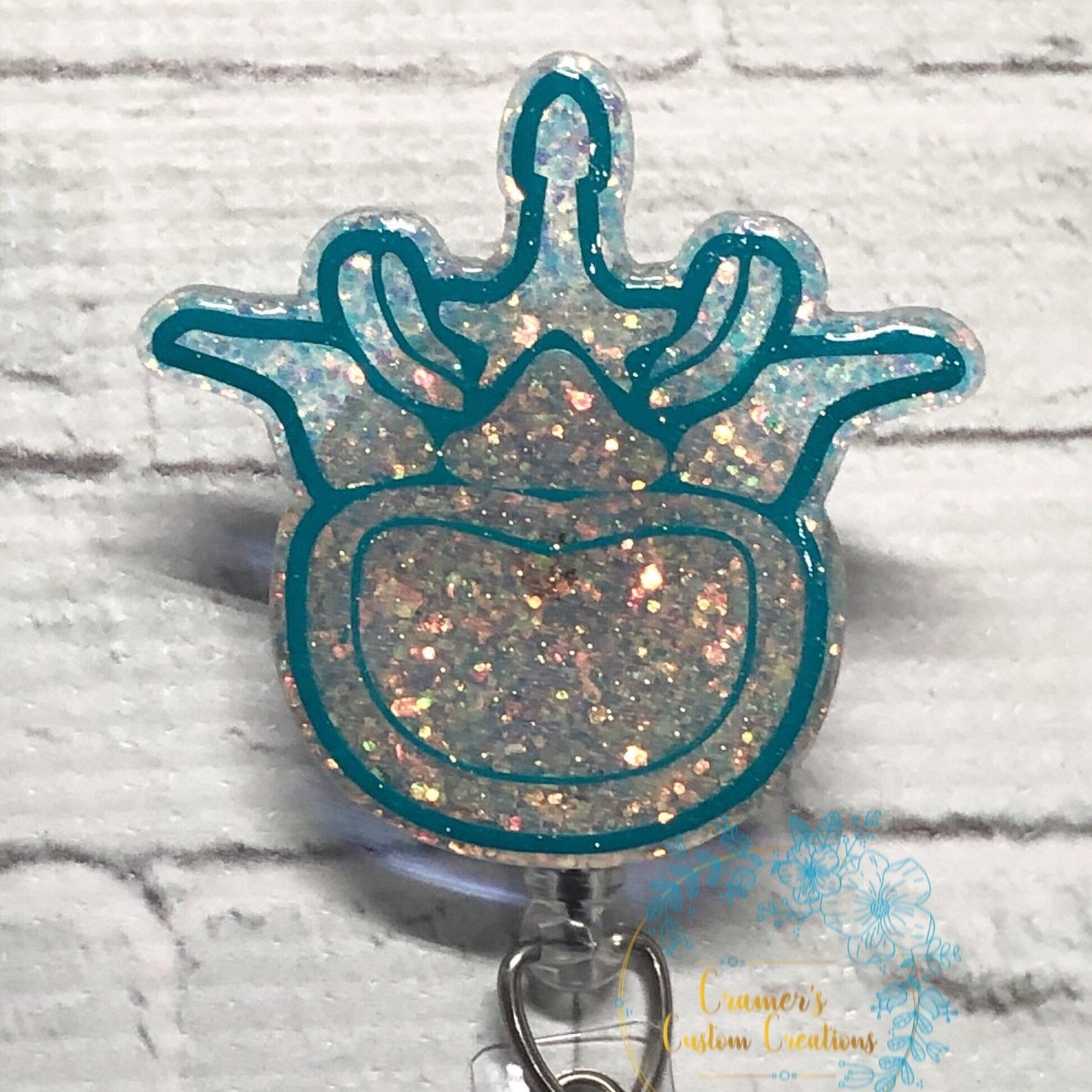 Vertebrae Badge Reel