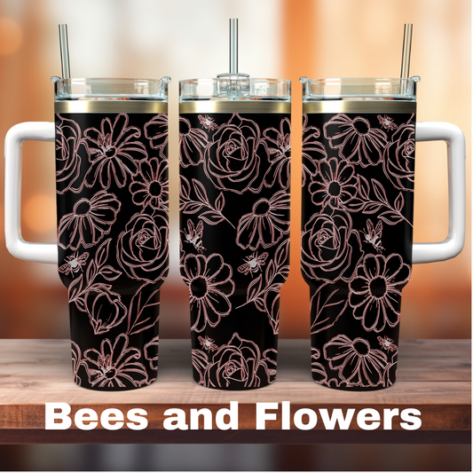 three 400z black tumblers with a bee and flower design over it all