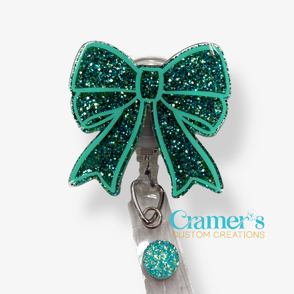 Glittery Bow badge reel in teal colors