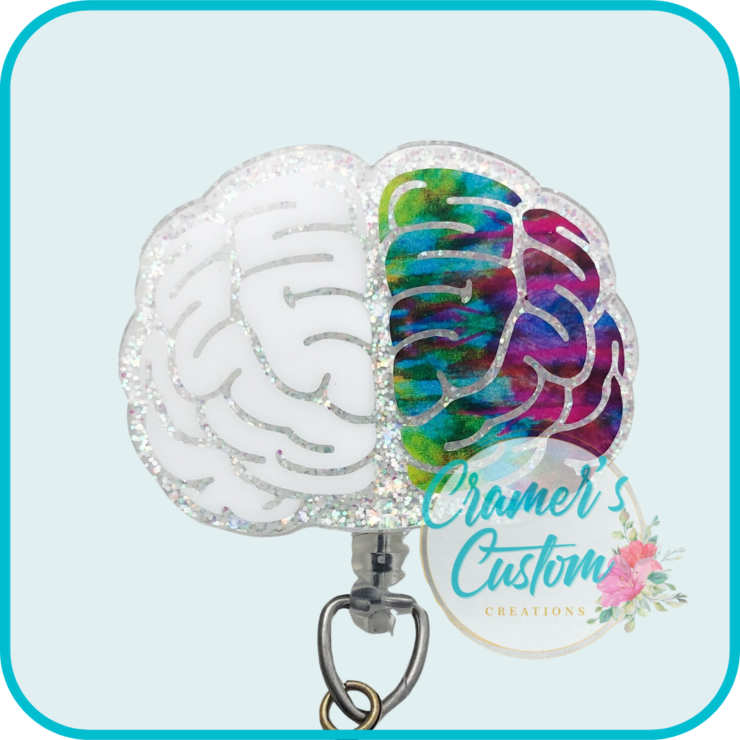 brain badge reel with one side white, one side multi color