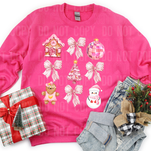 a pink sweatshirt with various designs of a coquette nature including gingerbread elements and bows