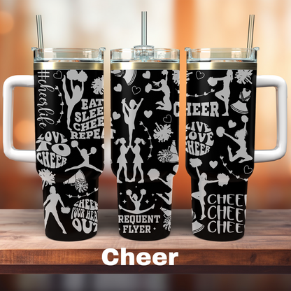 three 40oz black tumblers with cheer clip art all around it