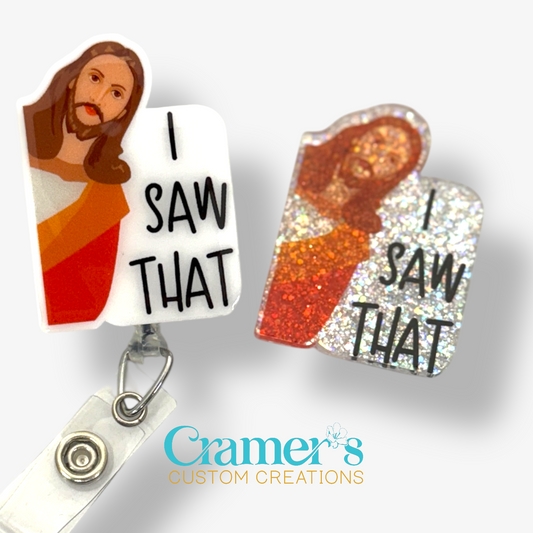 2 badge reels showing a glitter and a non glitter option of a badge with Jesus peeking around the corner and the text says I saw that