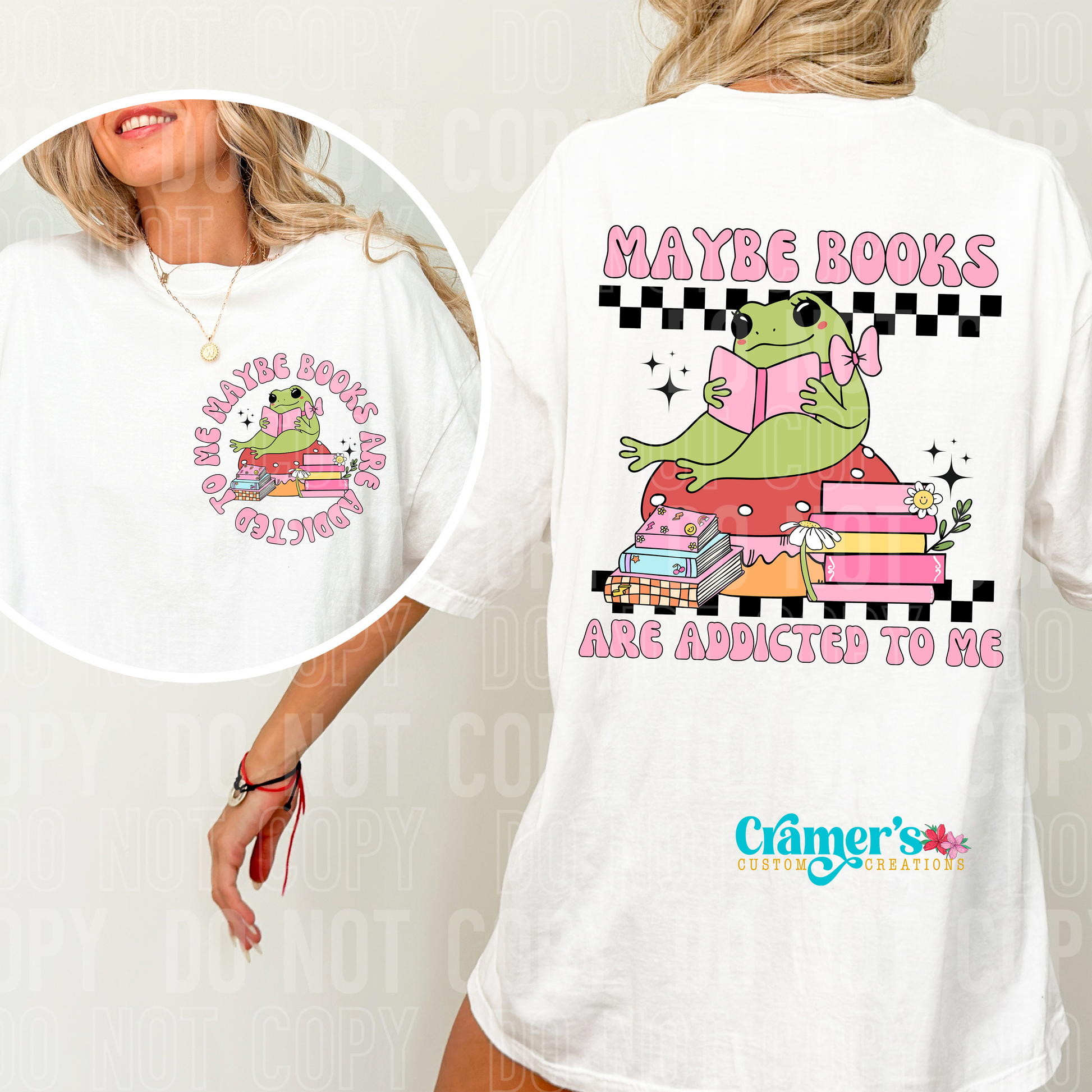a person wearing a white shirt showing the front and back designs. Design is a frog sitting reading saying maybe books are addicted to me
