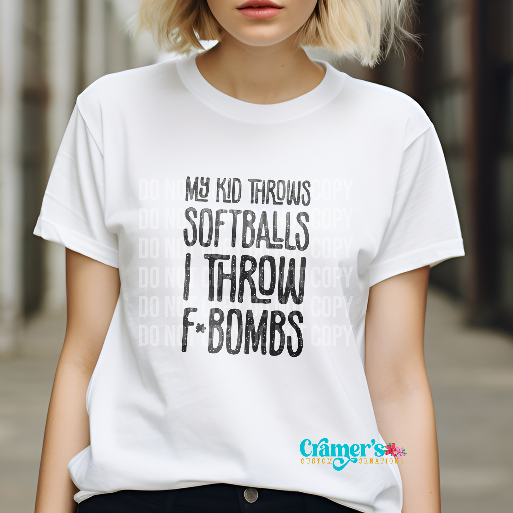 woman wearing a white shirt with the words my kid throws softballs I throw fbombs