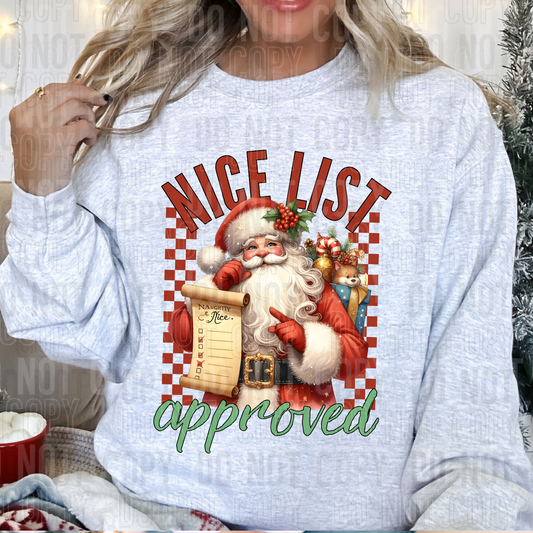 sweatshirt with nice list approved on it with santa holding a list