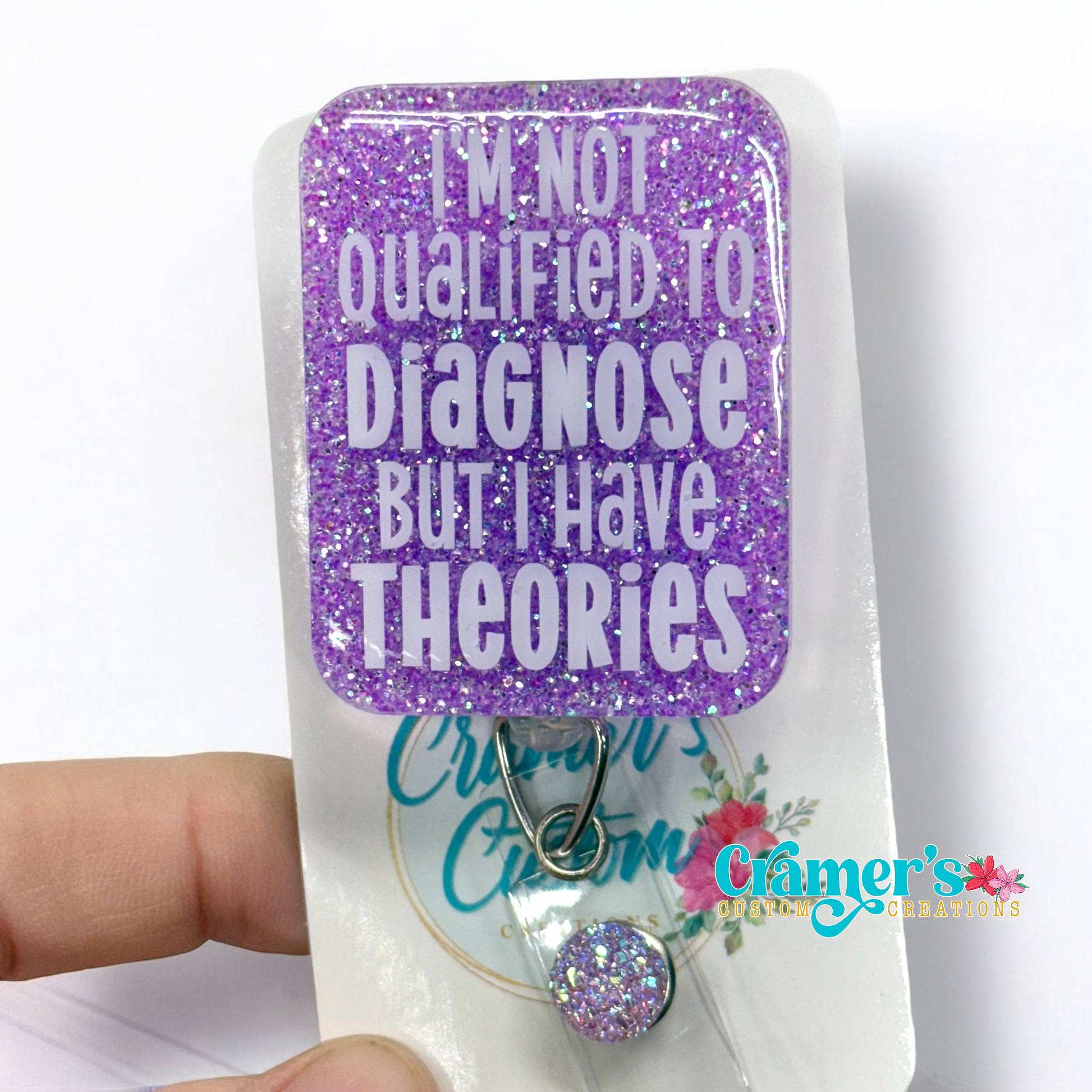 badge reel showing a purple glitter background with I'm not qualified to diagnose but I have theories in white