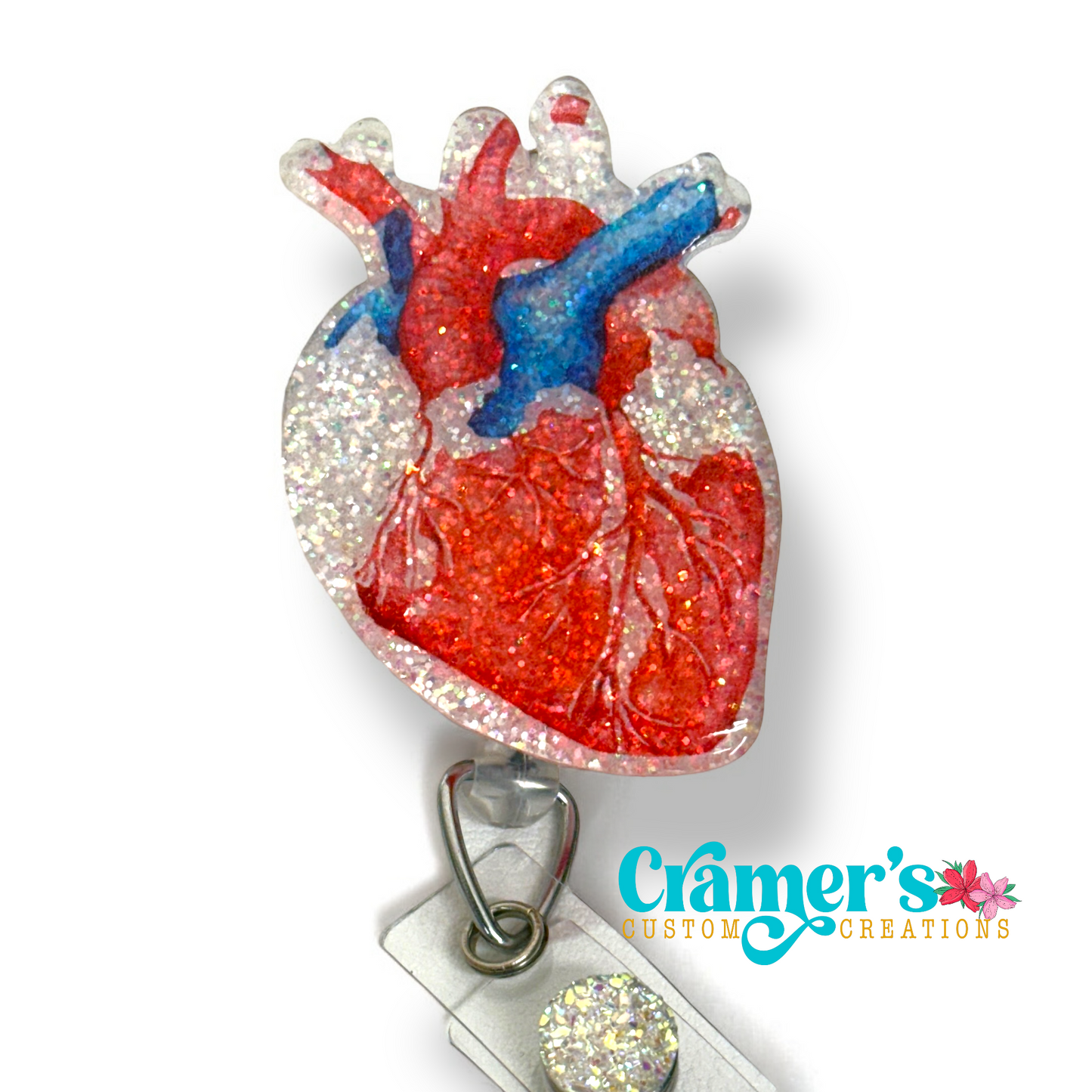 Realistic colored heart badge reel with a white glitter background