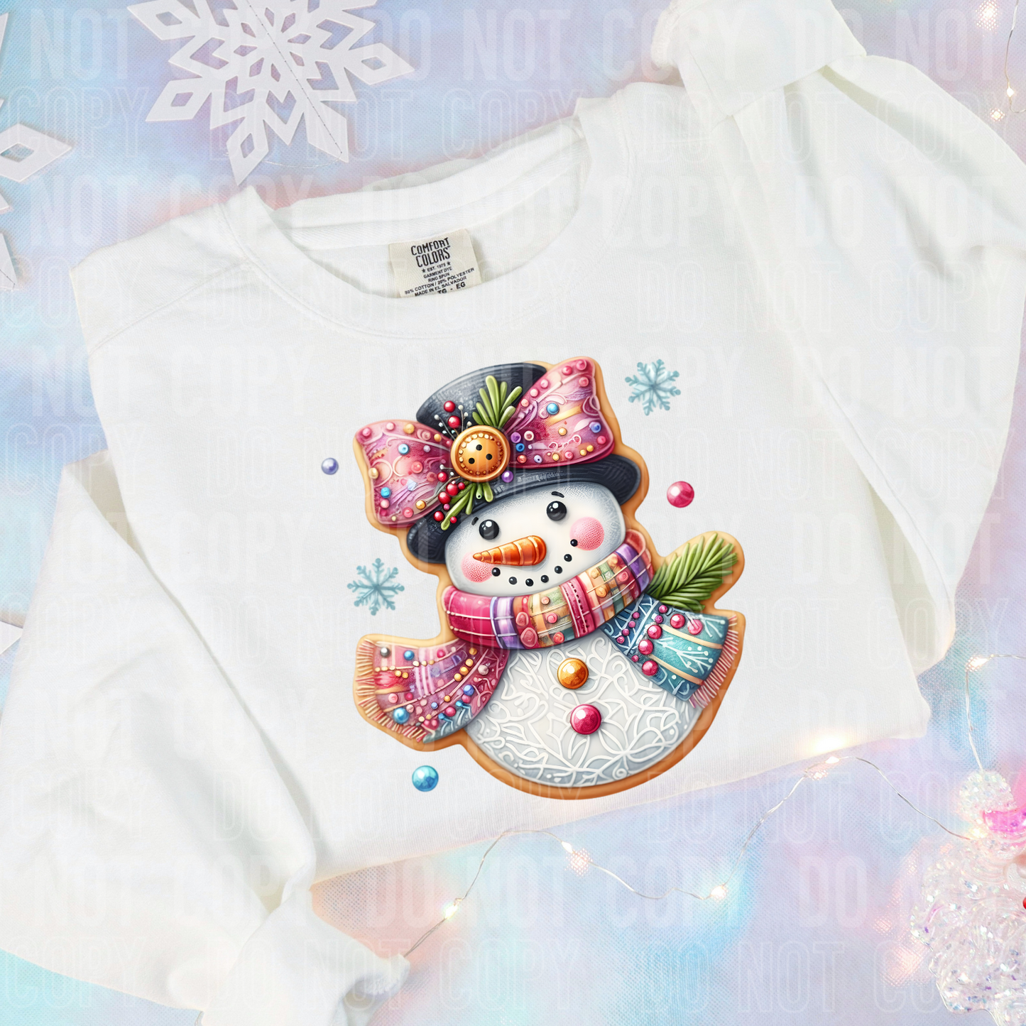 sweatshirt with a frosted snowman cookie