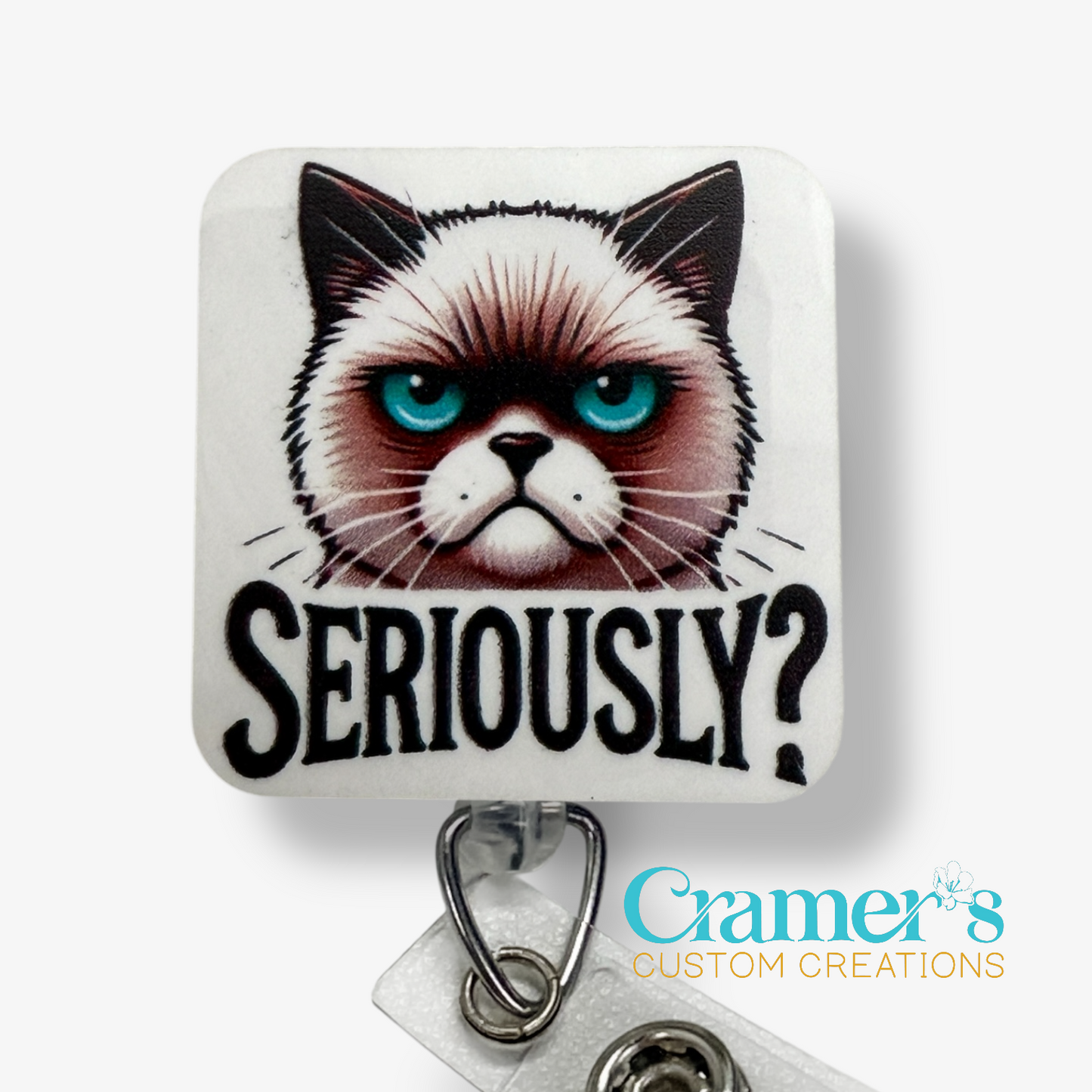 Square magnet with a cat illustration and 'SERIOUSLY?' text, featuring Cramer's Custom Creations logo.
