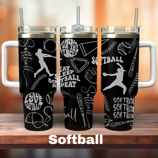 A set of three black tumblers with silver lids and silver straws, each featuring different softball-themed graphics and text.