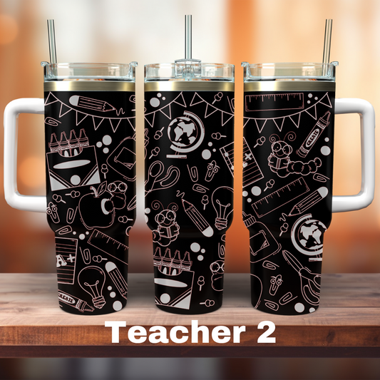 Two 40 oz tumblers with a black and white graphic design, featuring straws, and labeled 'Teacher 2'.