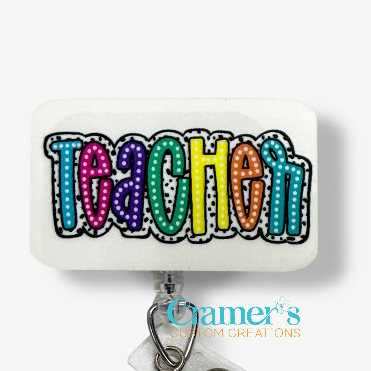 Colorful 'Teacher' text on a white background with Cramer's Custom Creations logo.