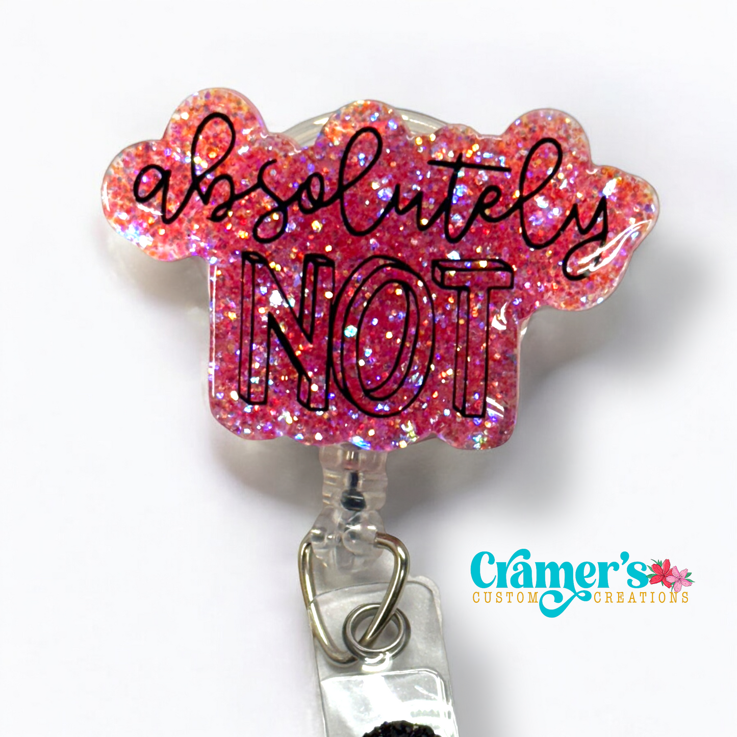 badge reel showing a pink glitter background with absolutely not in white