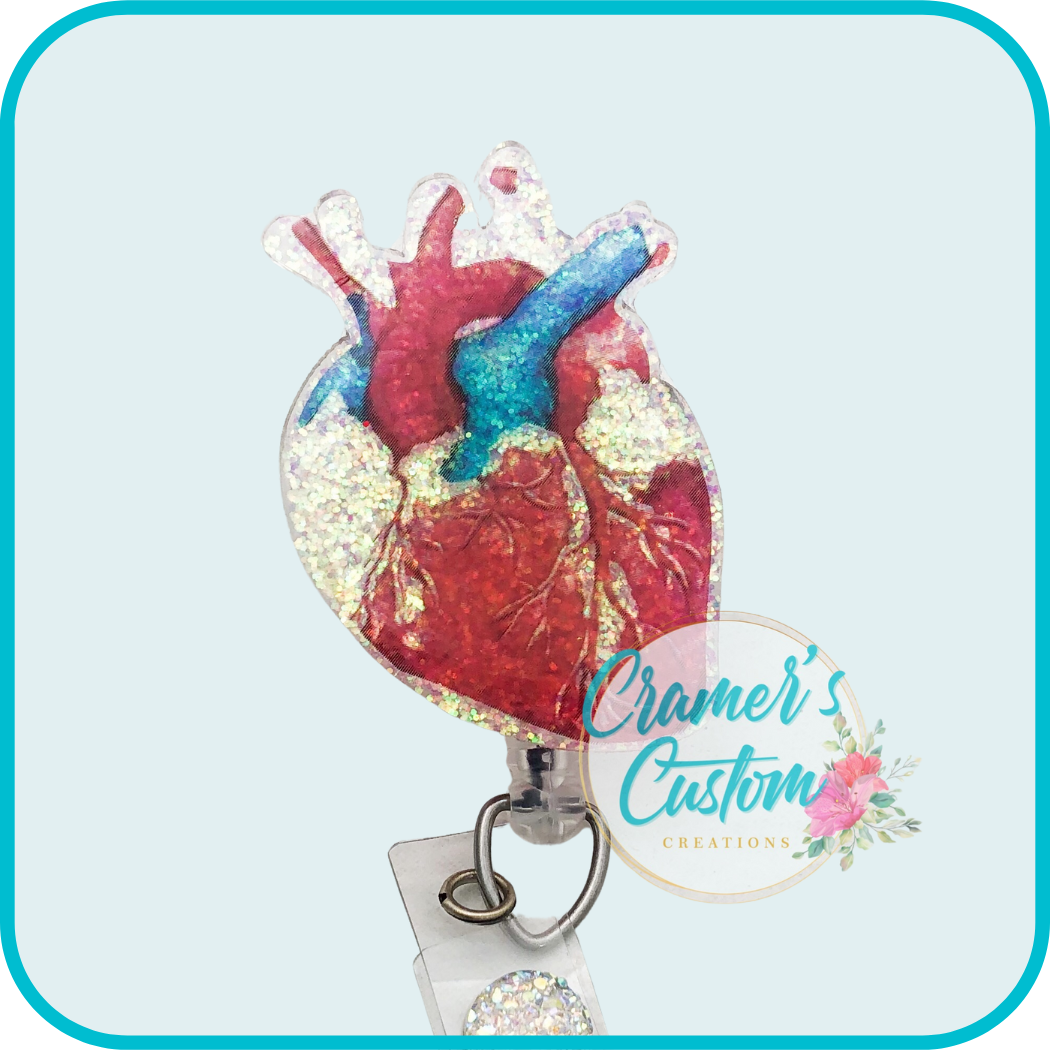 a glittery heart badge reel