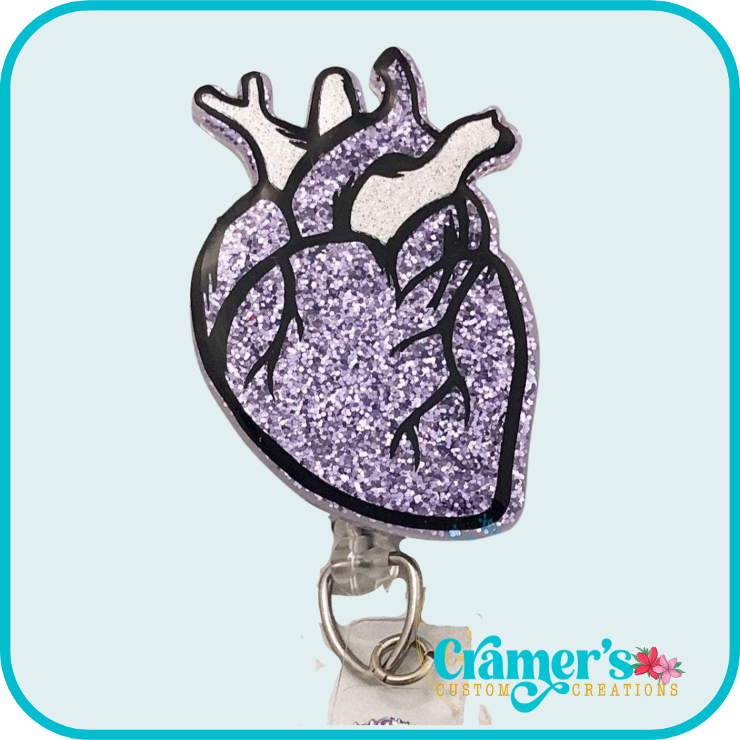 a glittery heart badge reel purple