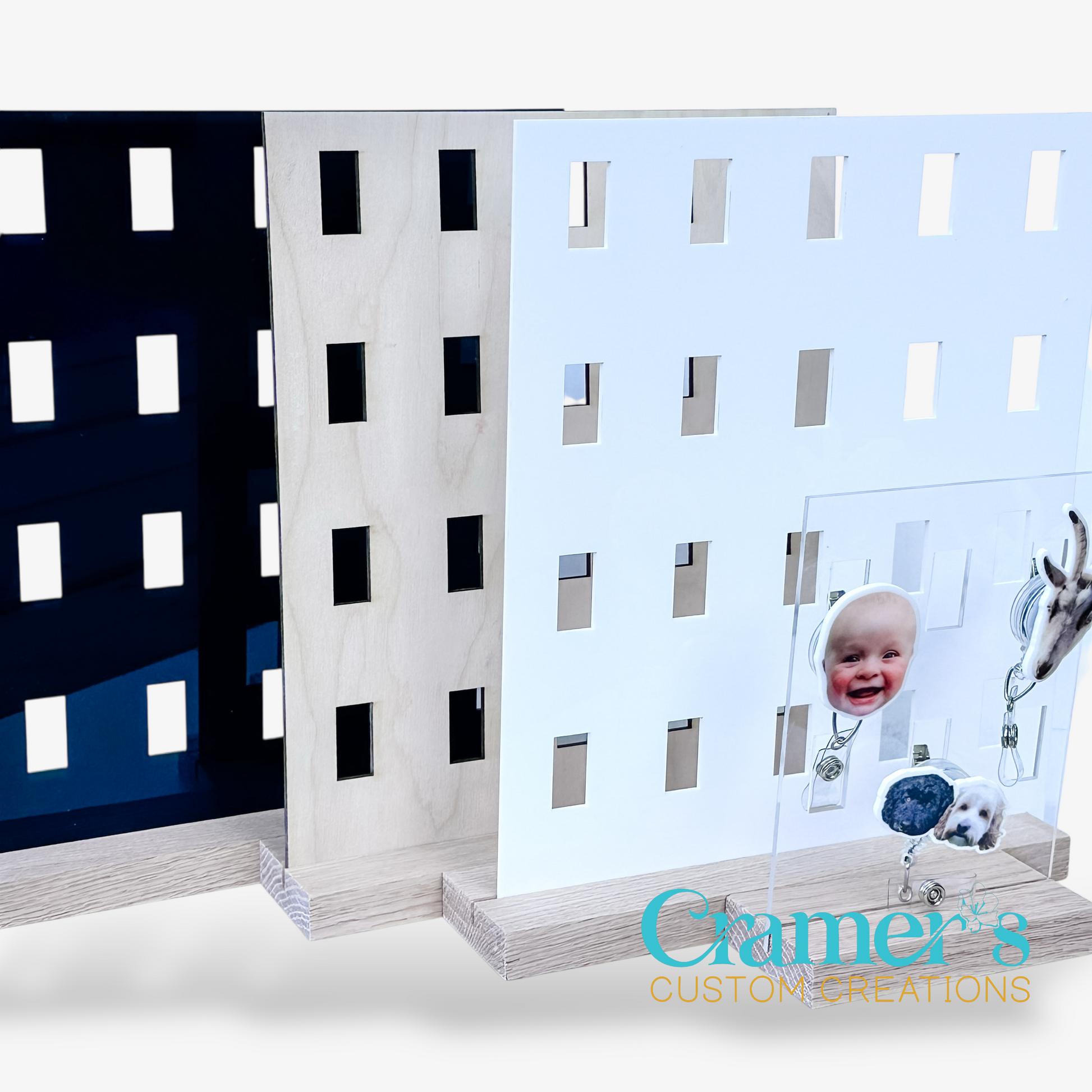 4 badge reel displays sitting on a white background