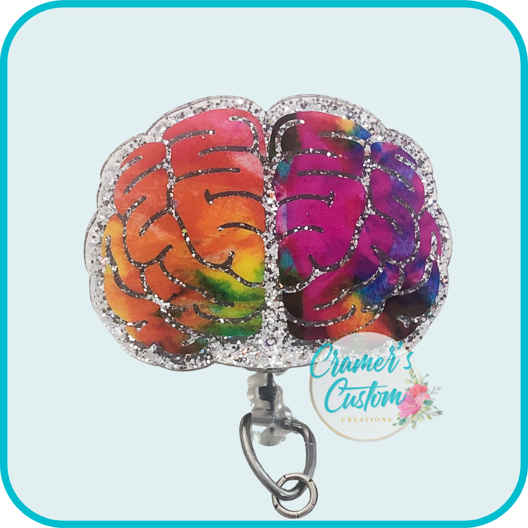 brain badge reel with multicolor vinyl and silver glitter