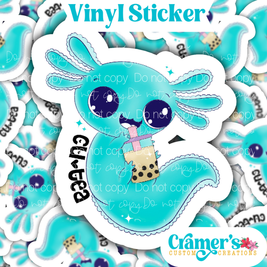 A vinyl sticker depicting a stylized axolotl character with a boba tea drink, predominantly in shades of blue and white.