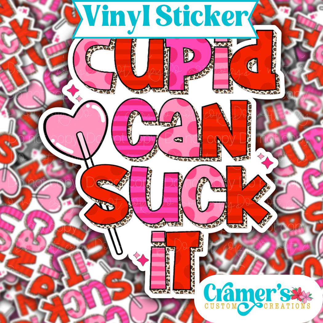 Sticker laying flat that says cupid can suck it with a lollipop on a background of the same sticker stacked up
