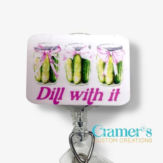 Decorative candy with pickles and 'Dill with it' text, featuring Cramer's Custom Creations logo.