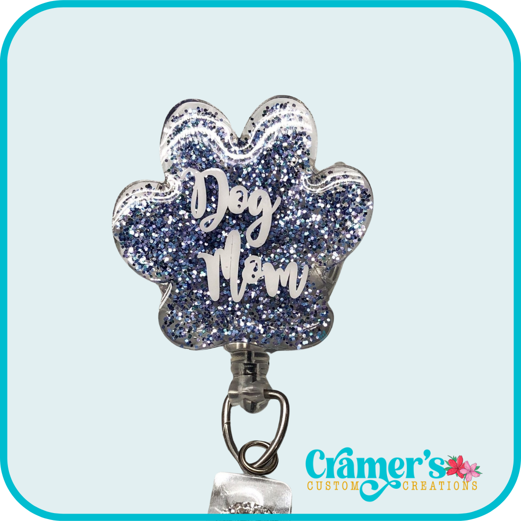 light blue glitter paw print with dog mom on it