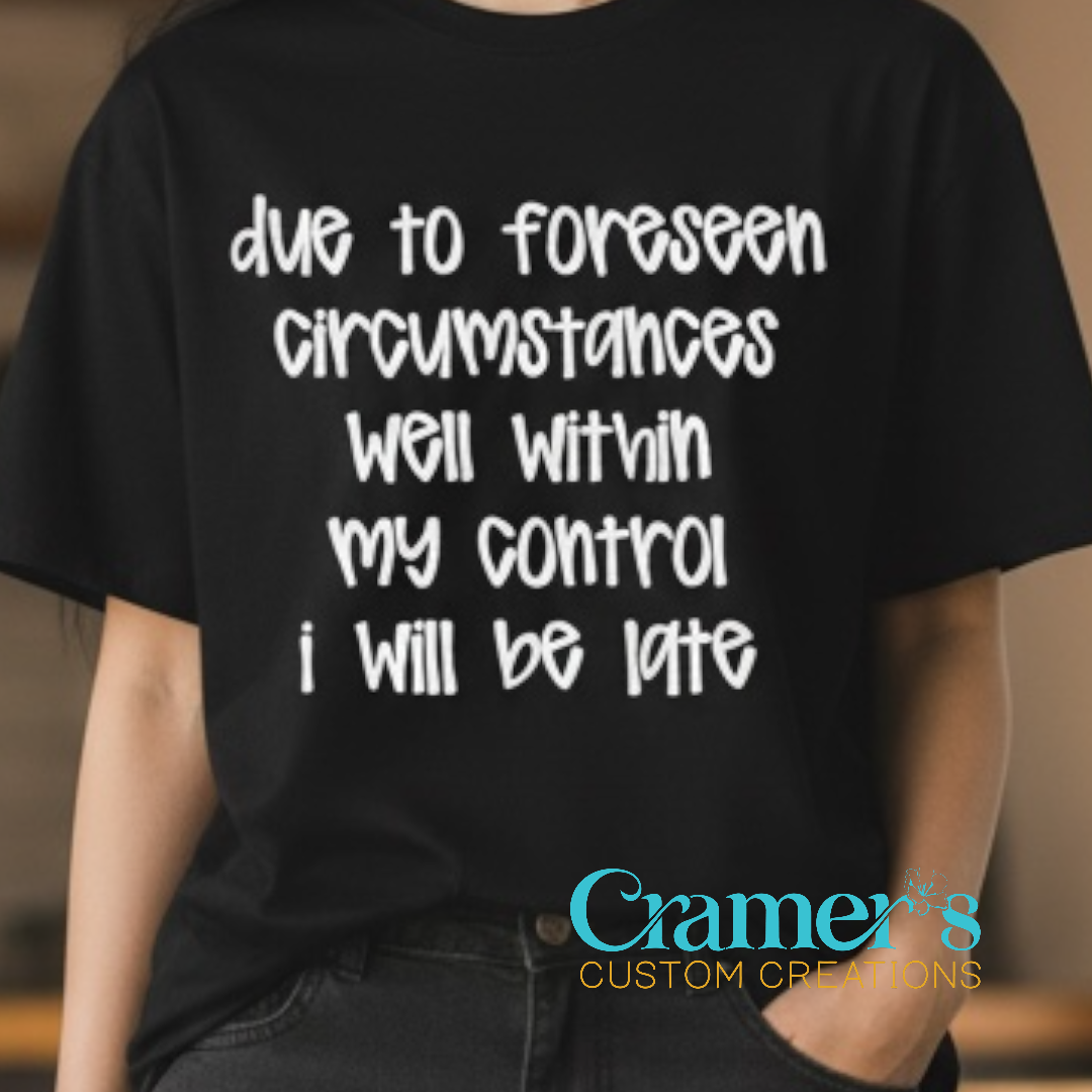 Person wearing a black t-shirt with humorous text and Cramer's Custom Creations logo.