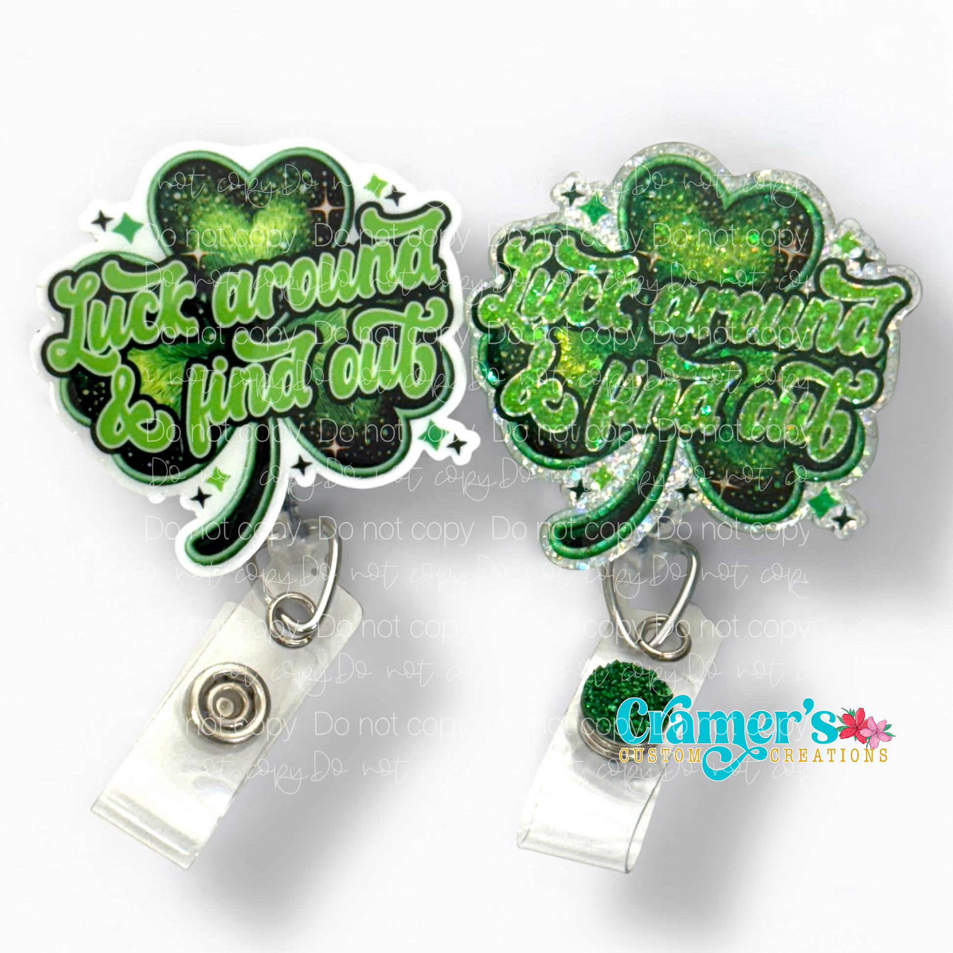 2 badge reels showing a glitter and a non glitter option of a shamrock that says luck around and find out