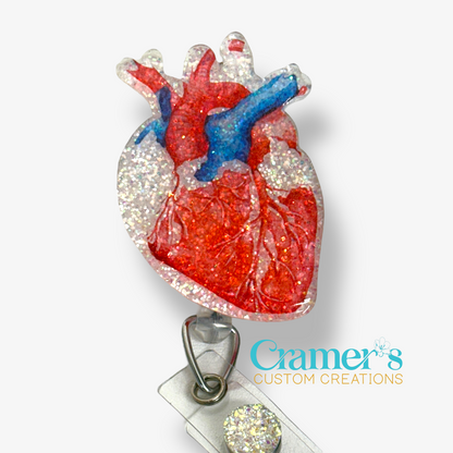 Realistic colored heart badge reel with a white glitter background
