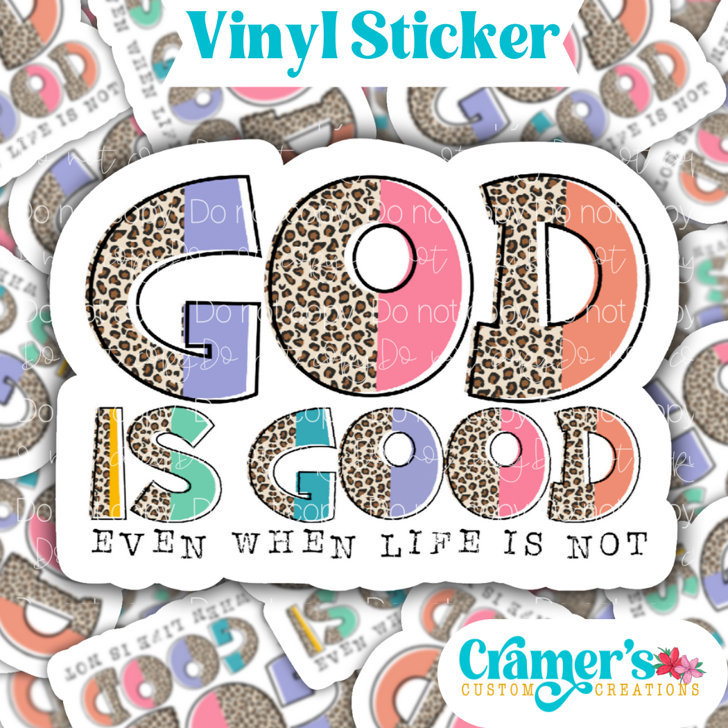 Sticker laying flat that says god is good even when life is not on a background of the same sticker stacked up