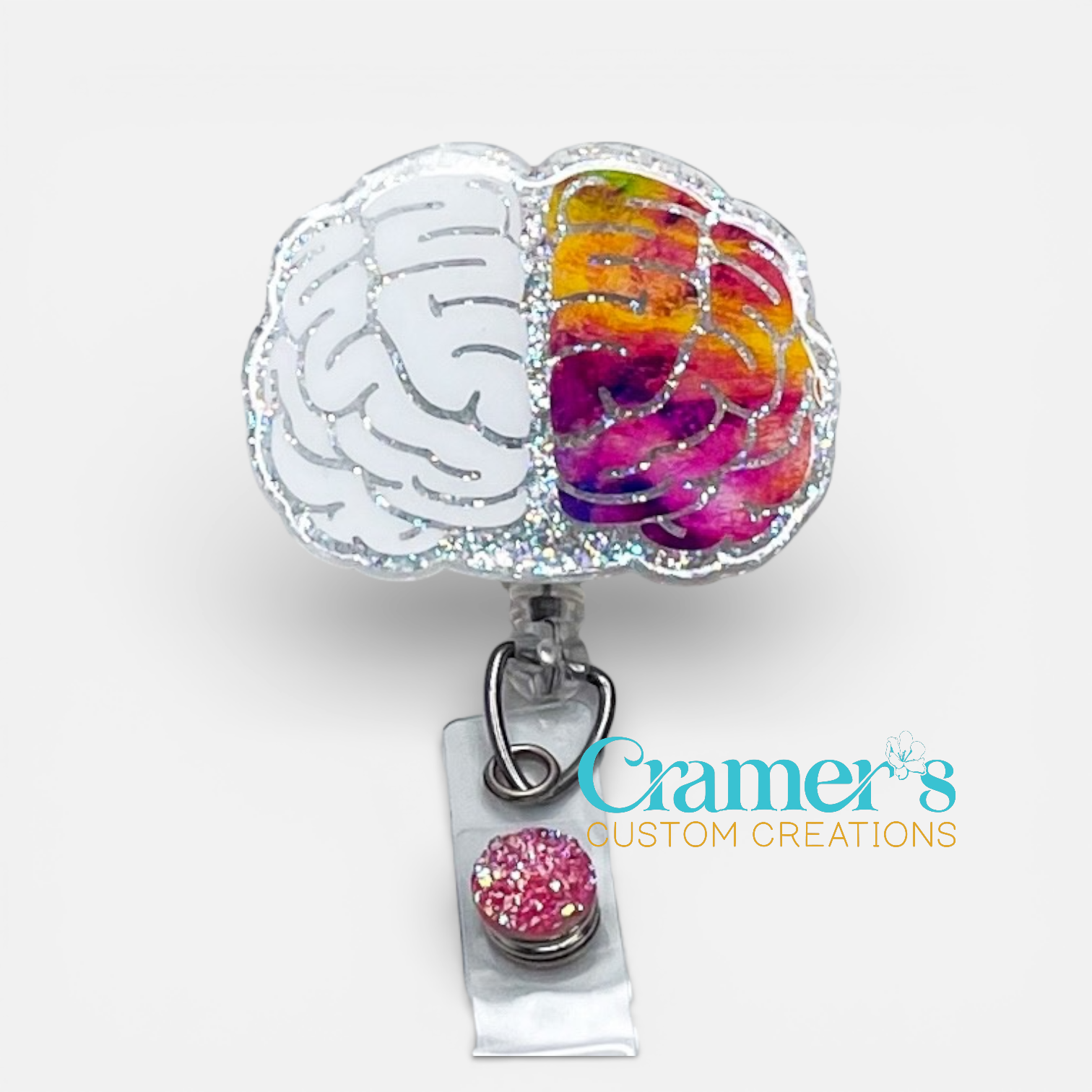 brain badge reel with one side white, one side multi color