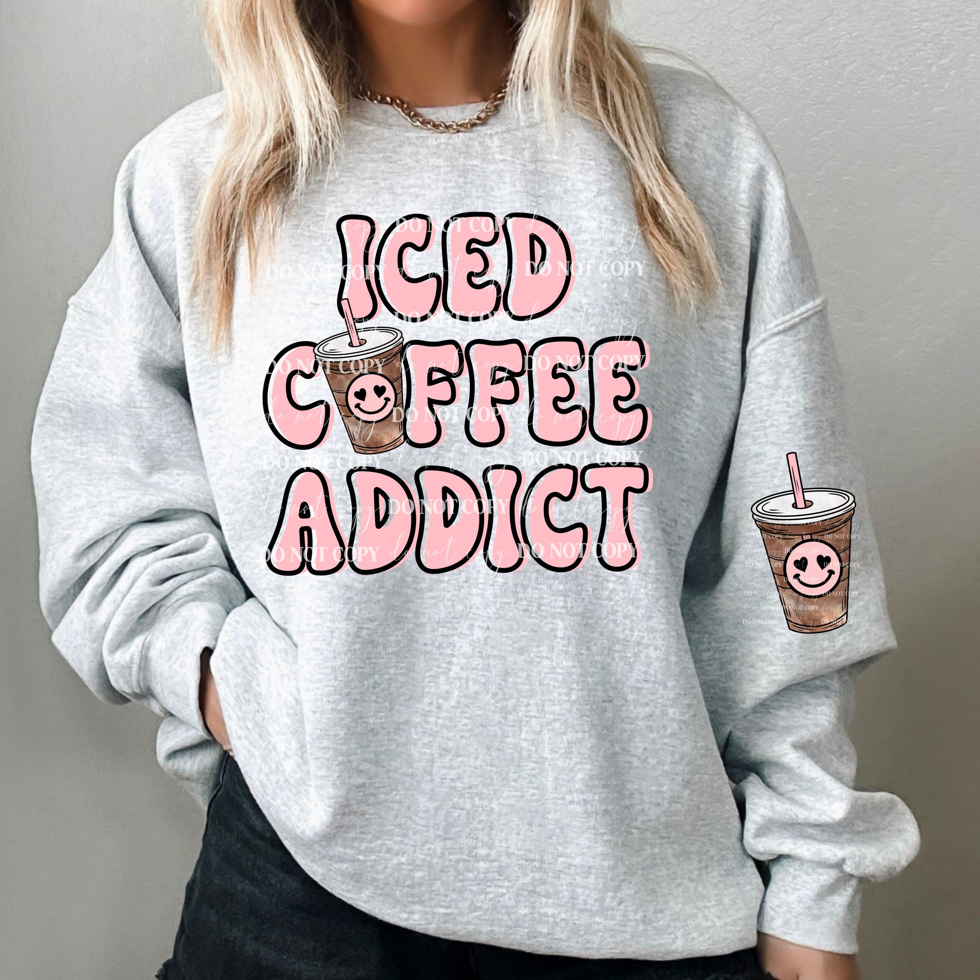 A gray sweatshirt with the text 'ICED COFFEE ADDICT' and illustrations of two cups of iced coffee on the front and back.