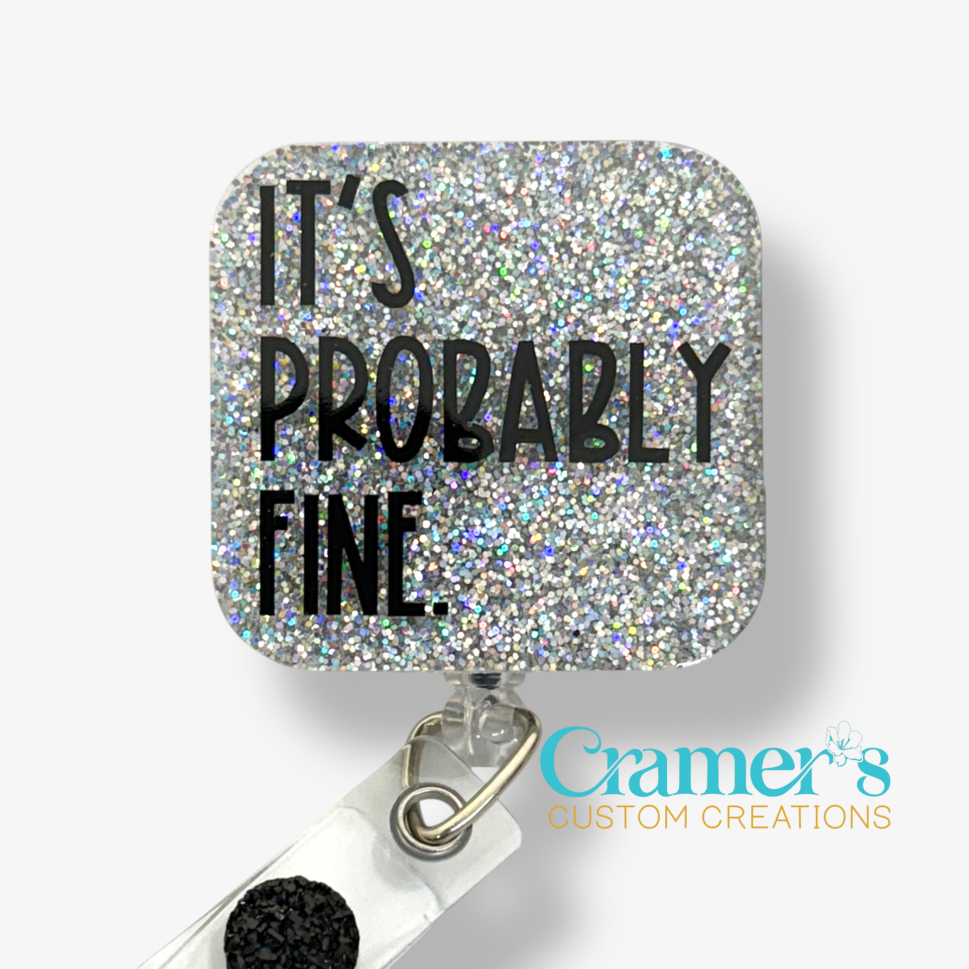 badge reel showing a silver glitter background with It's probably fine in black