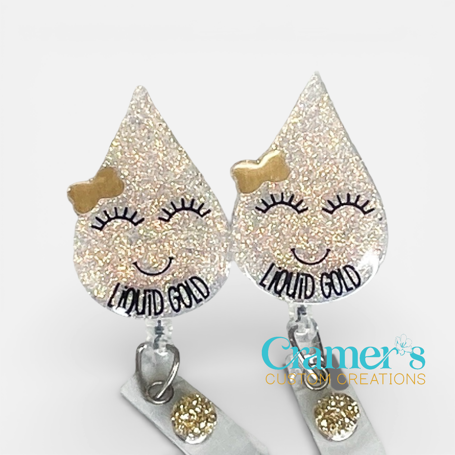 liquid gold badge reel on a white background
