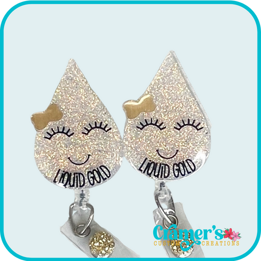 liquid gold badge reel on a white background