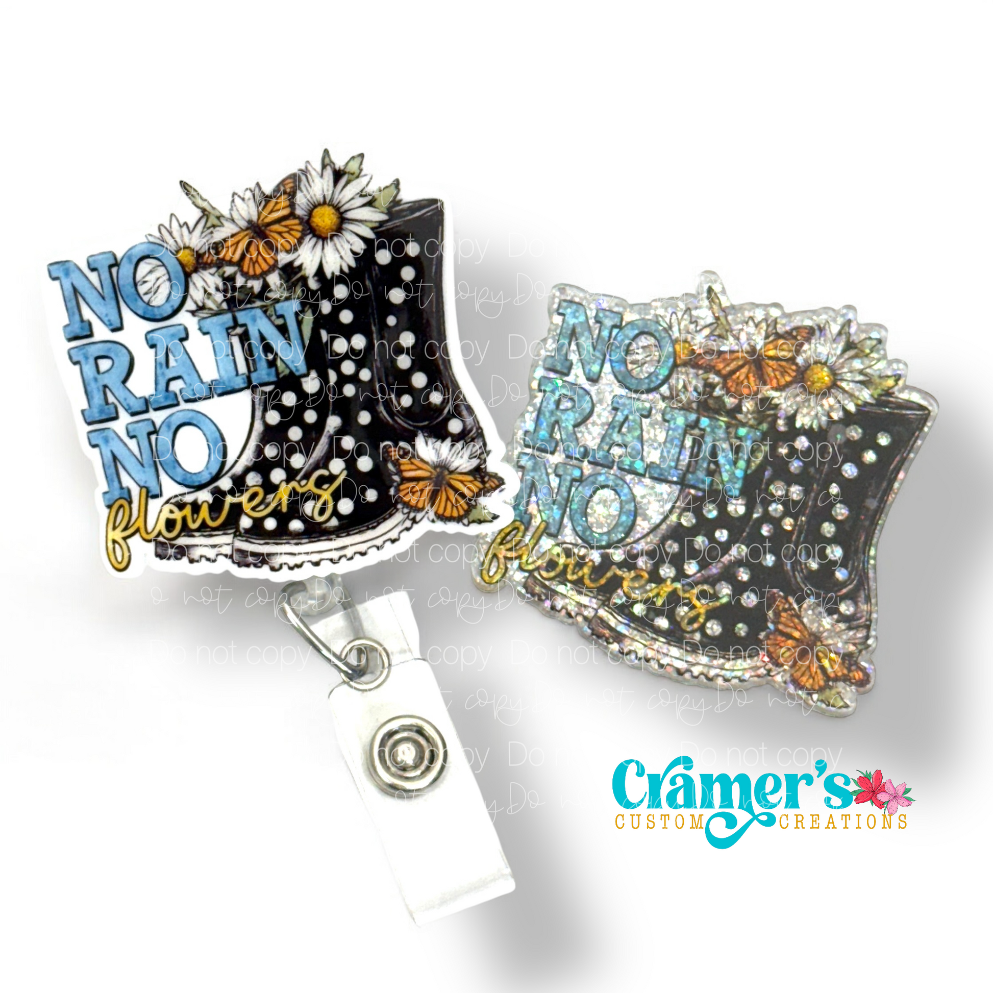 2 badge reels showing a glitter and a non glitter option of a boot with flowers and butterflies that says no rain, no flowers