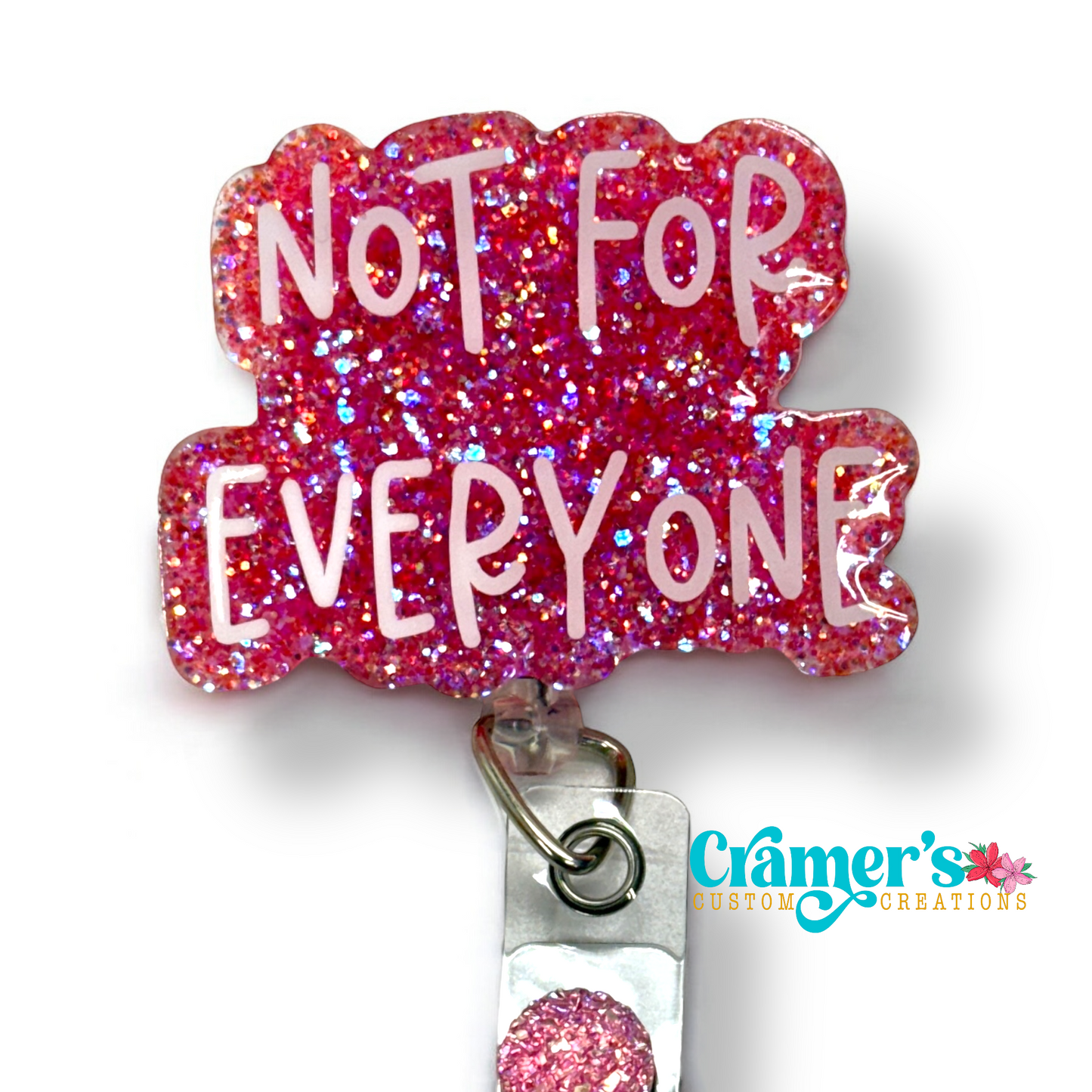 badge reel showing a pink glitter background with not for everyone in white