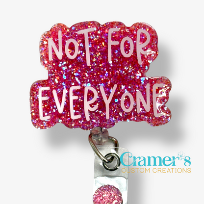 badge reel showing a pink glitter background with not for everyone in white