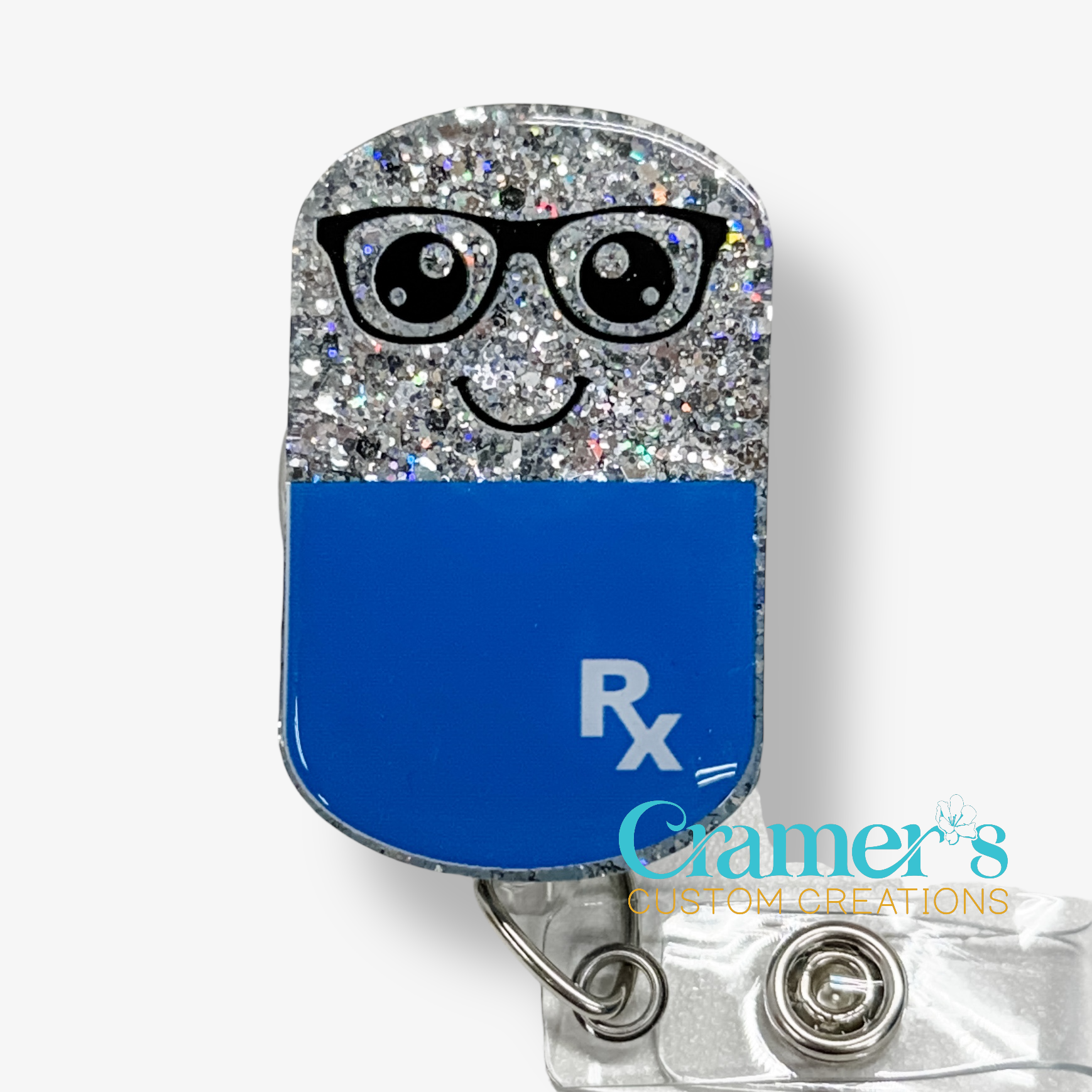 Glittery blue and silver badge holder with 'Rx' symbol on a white background