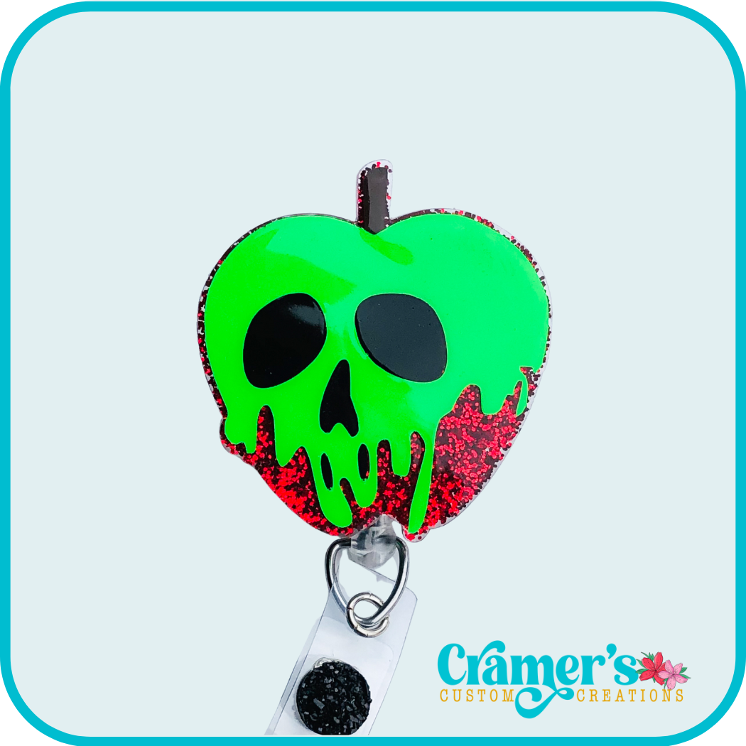 red glittery apple with green slime sliding down the face
