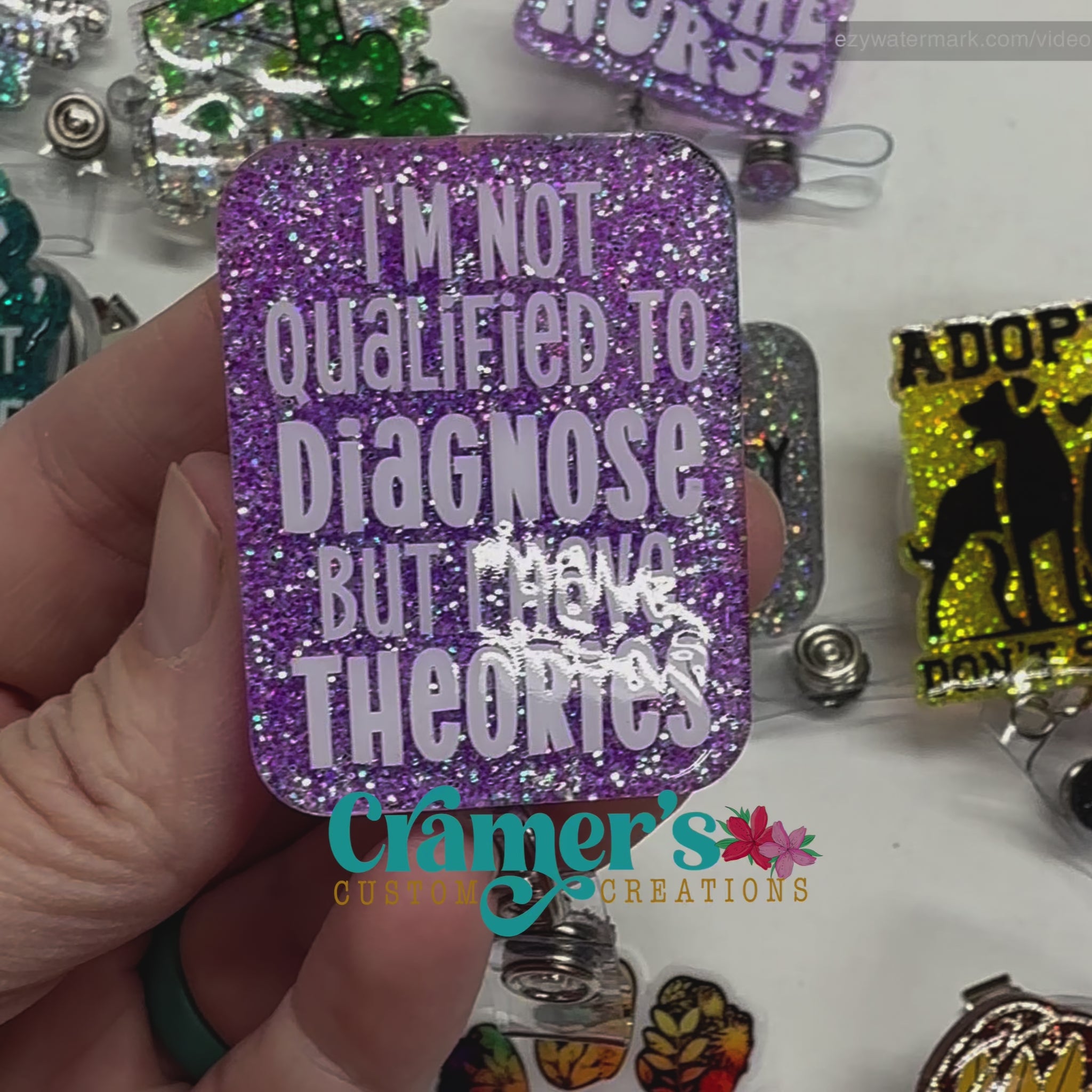 video of badge reel showing a purple glitter background with I'm not qualified to diagnose but I have theories in white