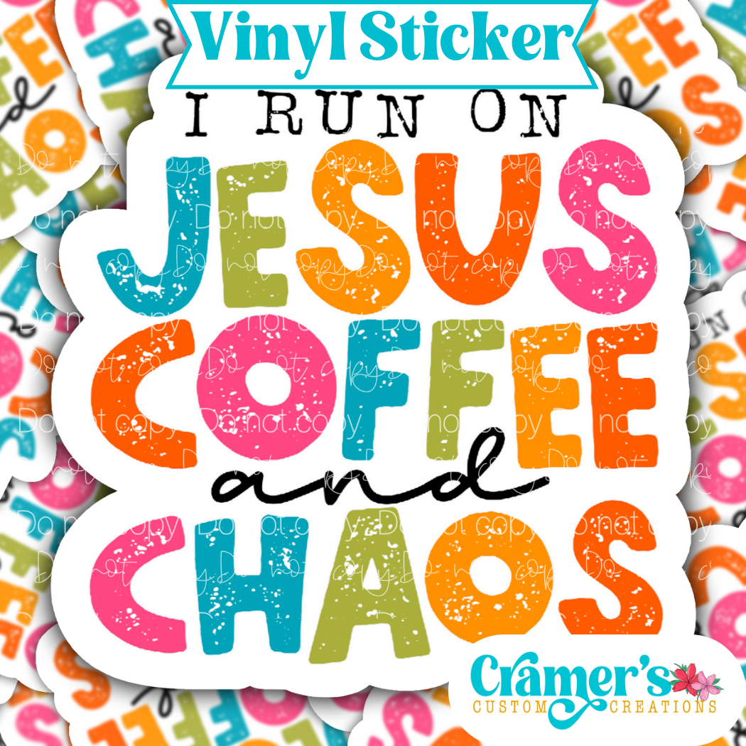 Sticker laying flat that says I run on jesus coffee and chaos on a background of the same sticker stacked up