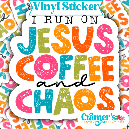 Sticker laying flat that says I run on jesus coffee and chaos on a background of the same sticker stacked up