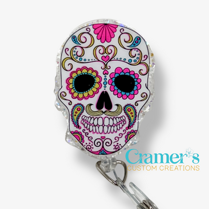 Colorful skull design badge holder with 'Cramer's Custom Creations' branding on a white background