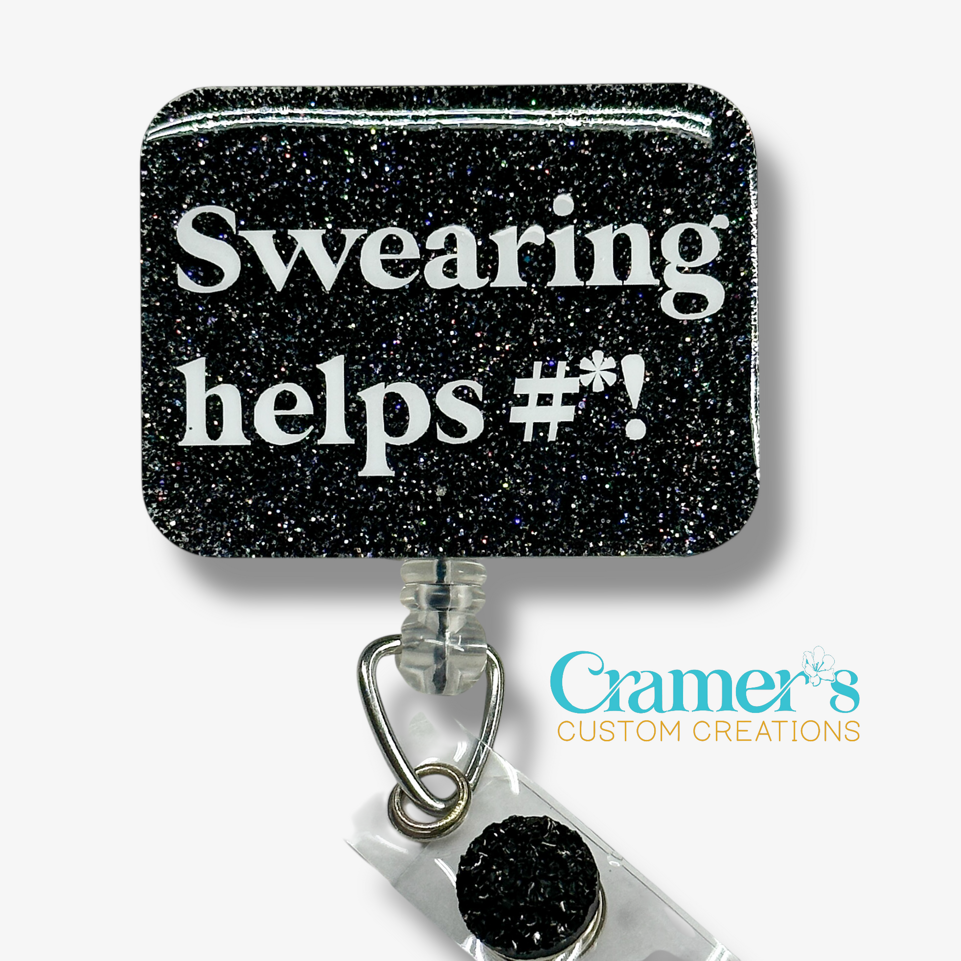 Black glittery badge holder with text 'Swearing helps #*!' and Cramer's Custom Creations logo.