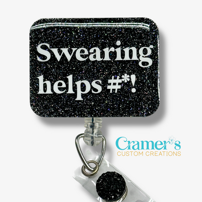 Black glittery badge holder with text 'Swearing helps #*!' and Cramer's Custom Creations logo.