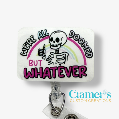 Sticker with skeleton design, rainbow, and text 'We're all doomed but whatever' on a white background with 'Cramer's Custom Creations' logo.