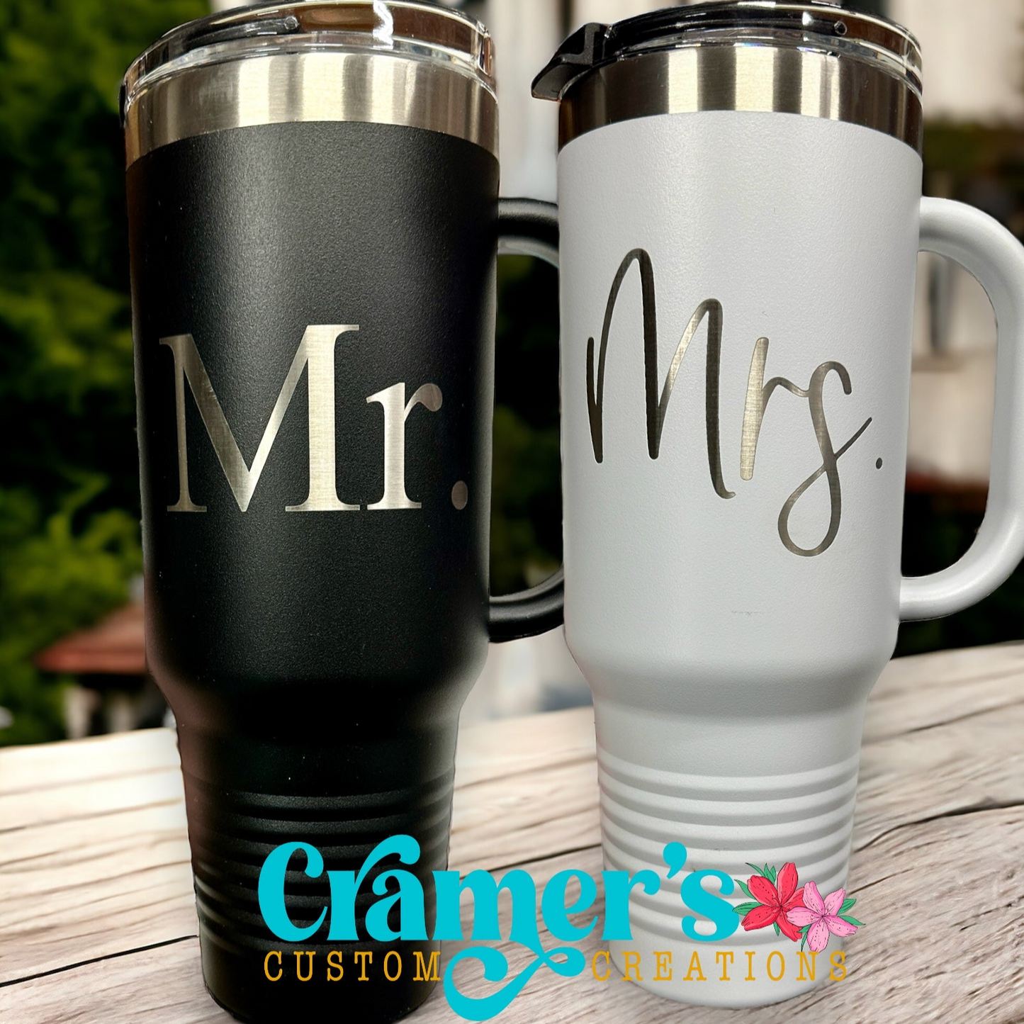 two 40oz tumblers, one white, one black with Mr and Mrs sitting on a white counter