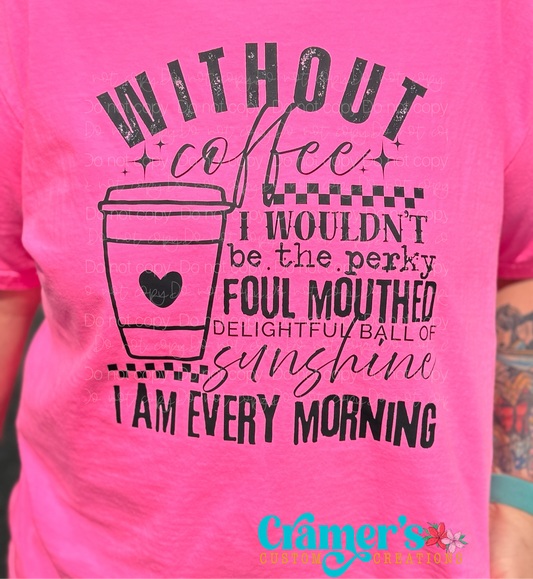 Pink t-shirt with coffee-themed text and a coffee cup graphic on a pink background.