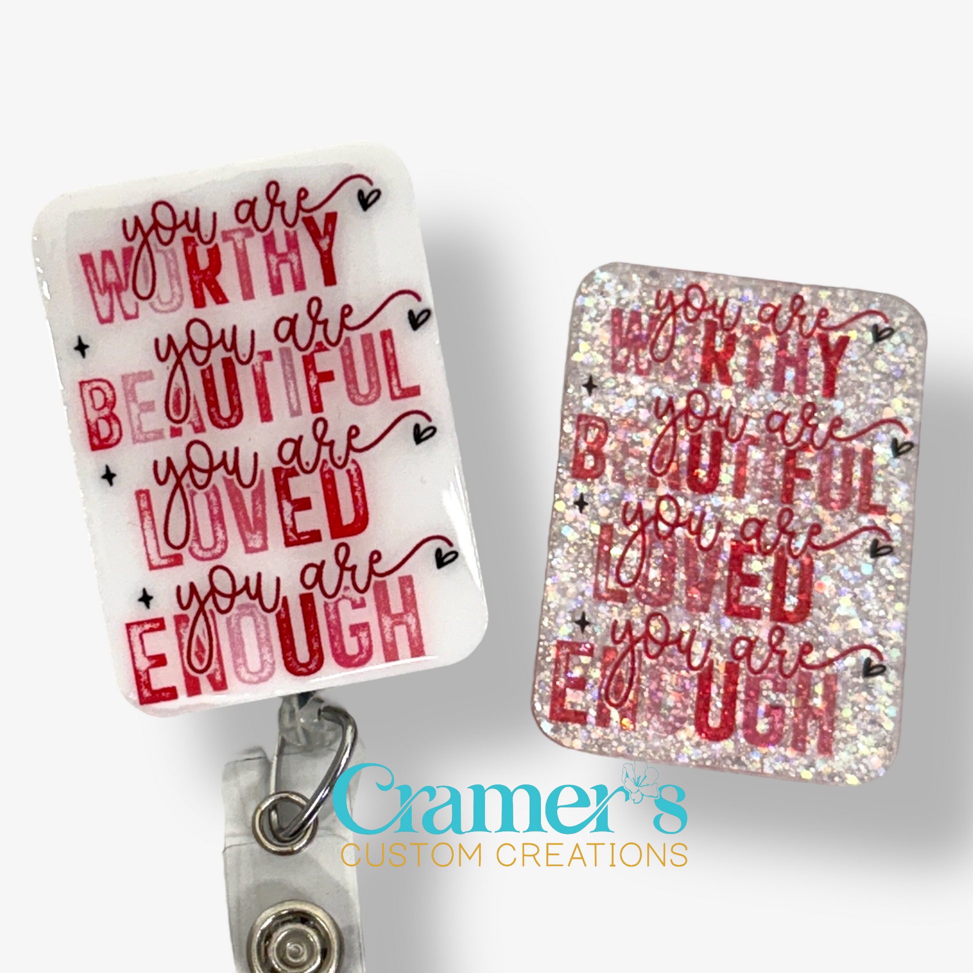 2 badge reels showing a glitter and a non glitter option of a badge with the words you are worthy you are beautiful, you are loved, you are enough in pink and red text